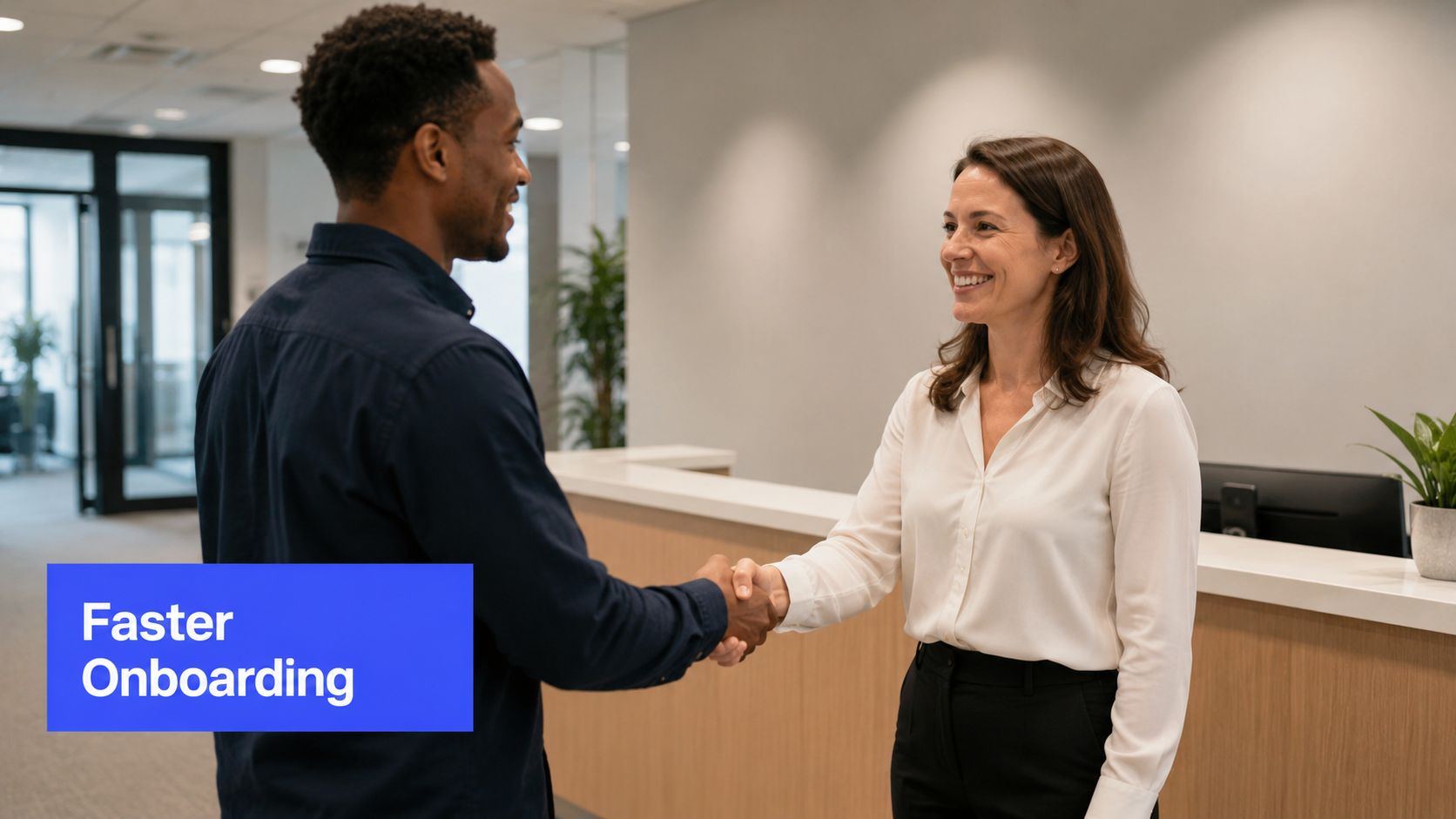 A professional man and woman shaking hands in a modern office space, symbolizing successful business onboarding processes.