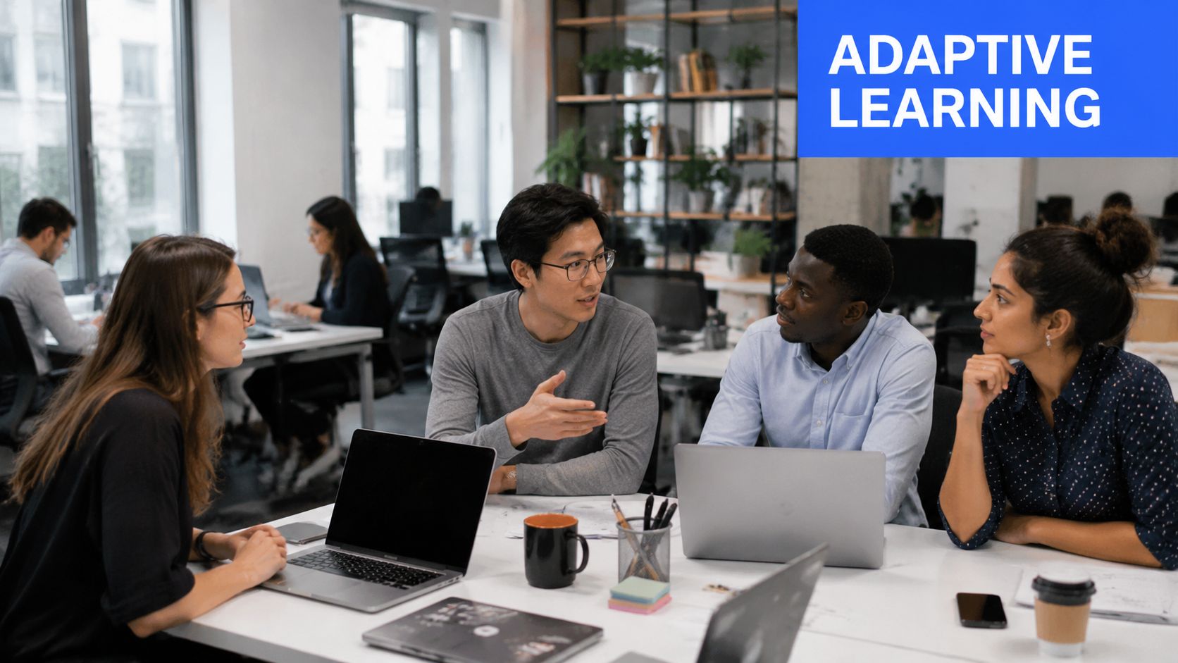 A diverse team of professionals collaborating during a product knowledge training session in a modern office environment.