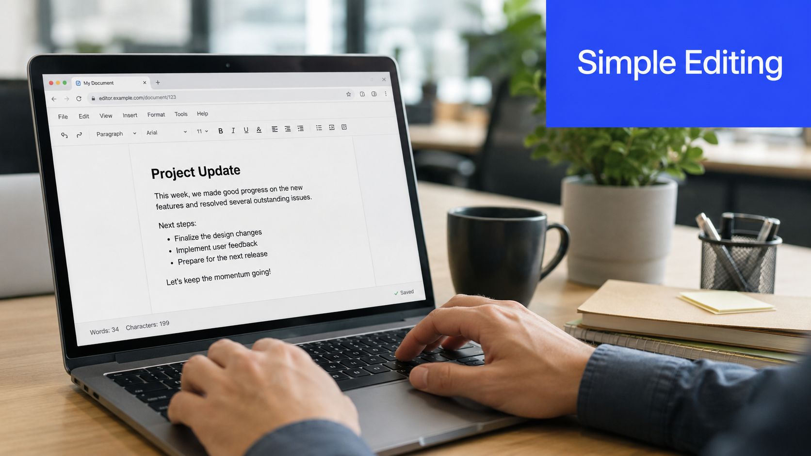 A person typing on a laptop displaying a text document with project updates in an office setting.