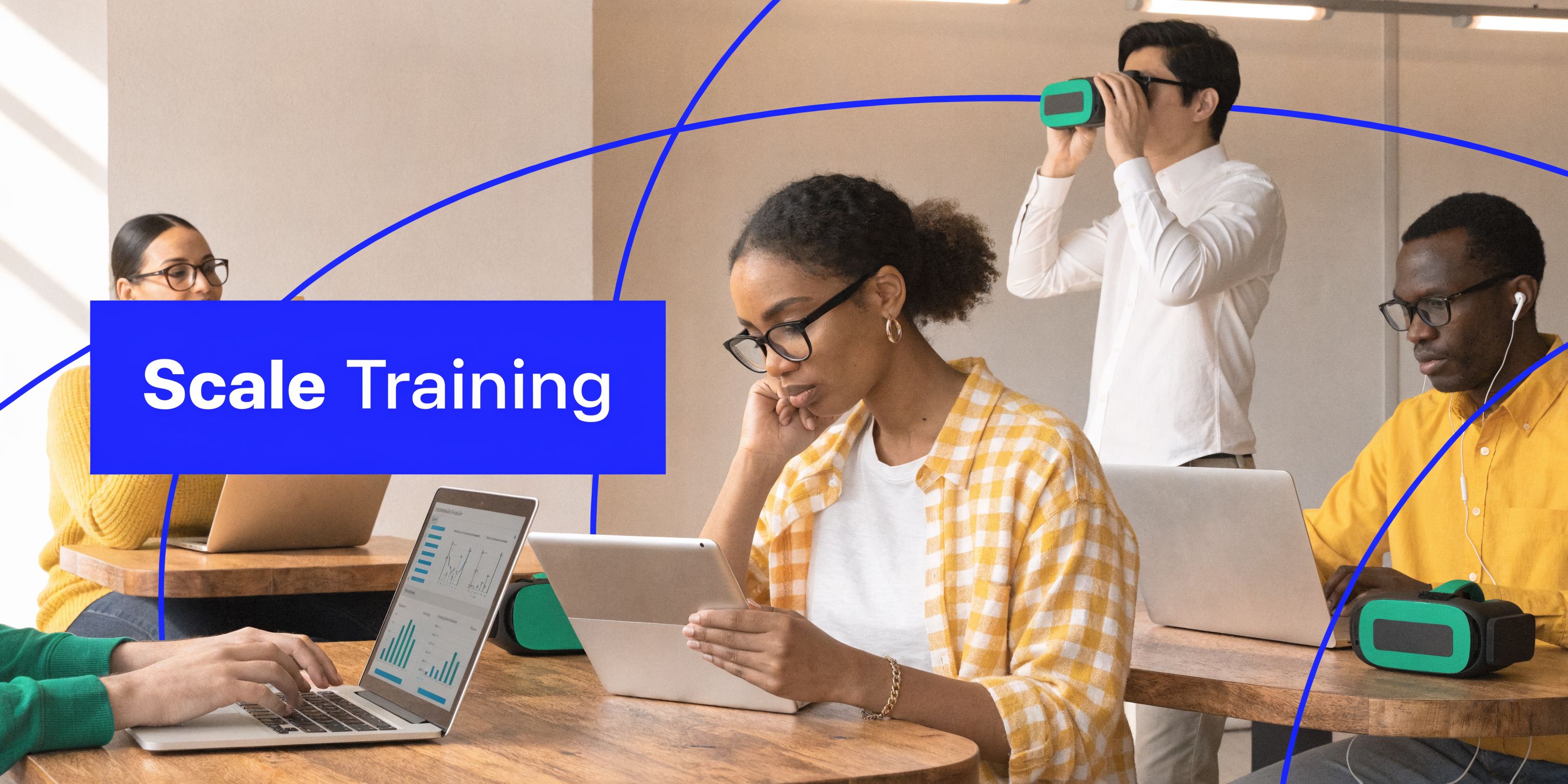A diverse group of professionals working in an office using laptops and virtual reality headsets for training.