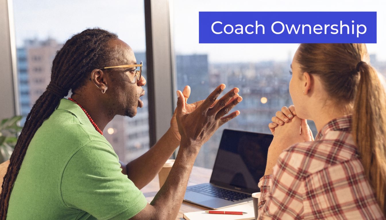 A professional man with dreadlocks gestures while speaking to a woman during a collaborative office meeting.